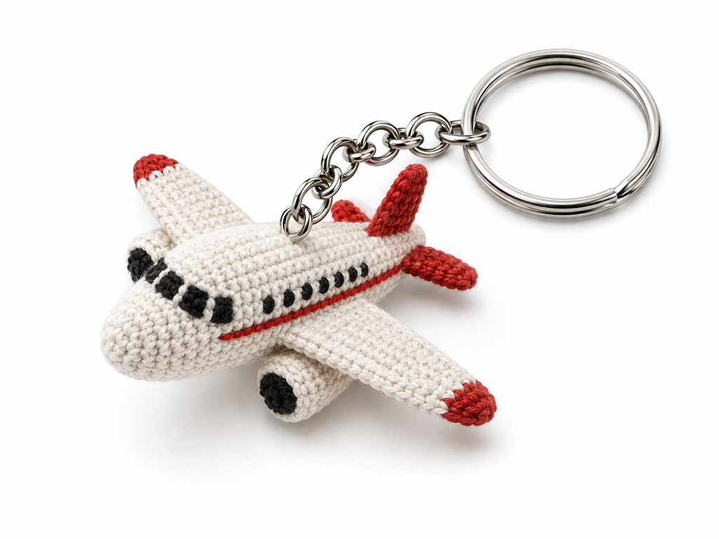 Take your style to new heights with this adorable Handmade Crochet Airplane Keychain from IkramiFy ✈️